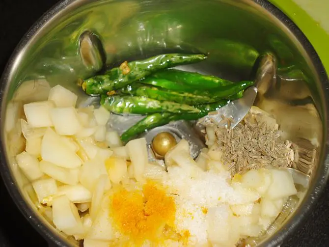 blending turmeric garlic dosakaya pachadi