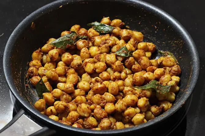 addition of stock to make dry chana recipe
