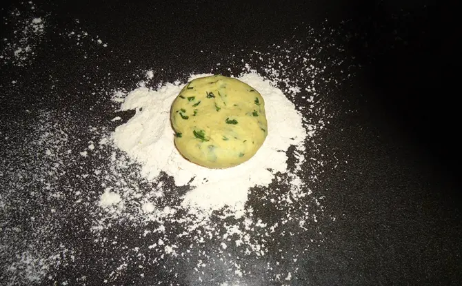 dusting flour for aloo methi paratha