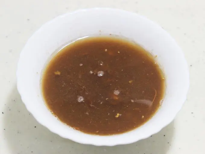 soaking tamarind to make drumstick sambar