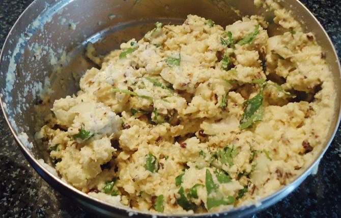 mixing chilies for alasandalu vada