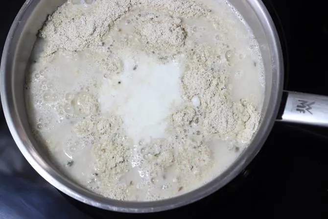 add water and curd to make oats idli