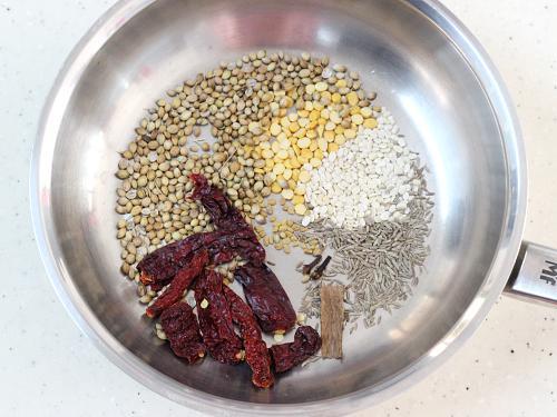 dry roasting spices in a pan for bisi bele bath powder