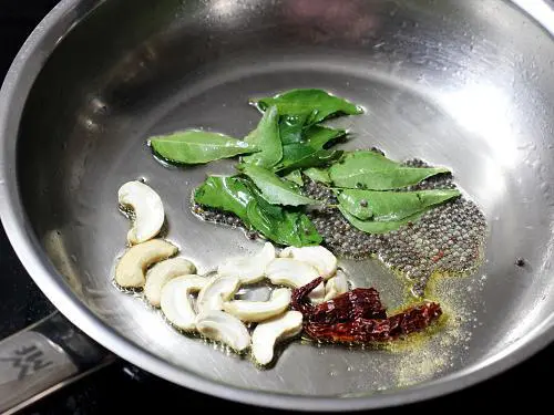 tempering bisi bele bath with spices