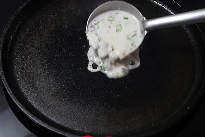 pouring batter over pan