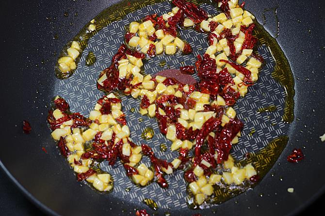 frying chilli garlic for fried rice