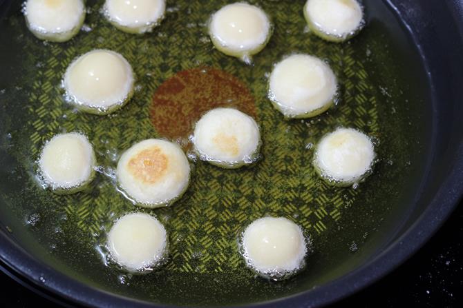 frying gulab jamun balls