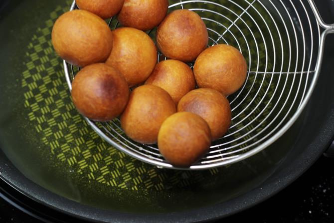 golden fried ghee gulab jamun