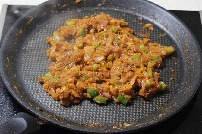 frying onion tomato mixture for tawa paneer masala recipe