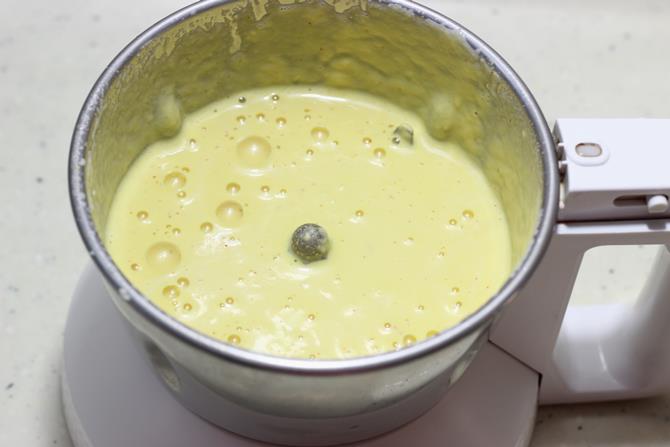 addition of milk to blend the ingredients for badam kheer recipe