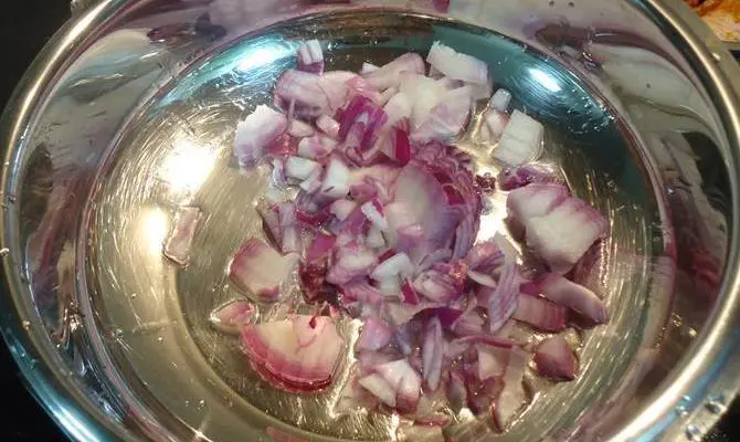 frying onions in pan