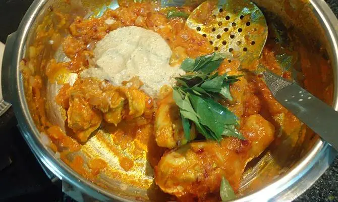 addition of ground spice paste for chettinad chicken curry recipe