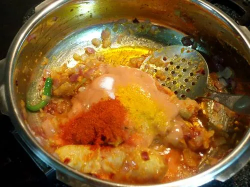 tomatoes and red chili in pan