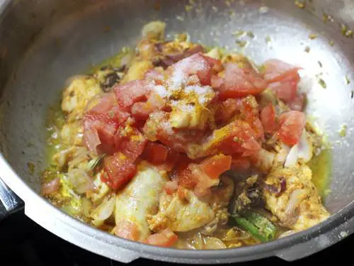 saute tomatoes, salt, turmeric