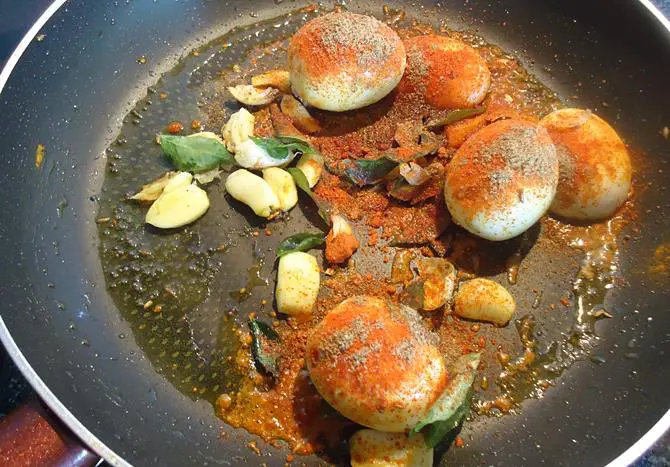 addition of spices for egg fry