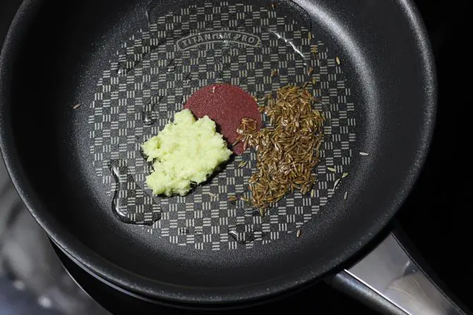 sauteing cumin for mixed vegetable curry