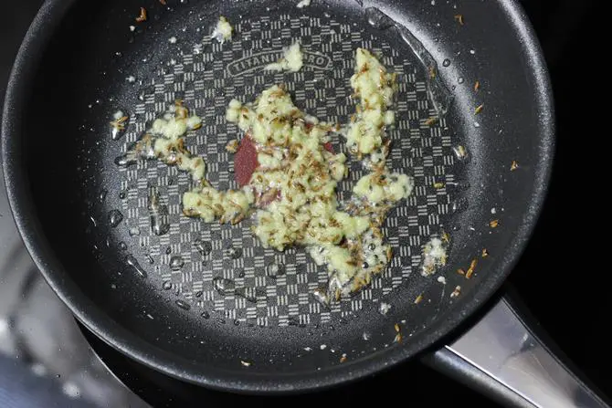 frying ginger garlic for mixed vegetable curry