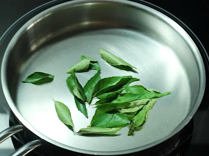 adding curry leaves