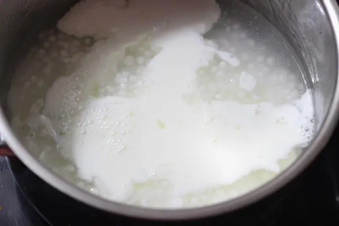 addition of milk to cooked sago for saggubiyyam payasam recipe