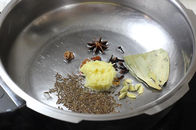 frying ginger garlic paste in oil for vegetable pualo