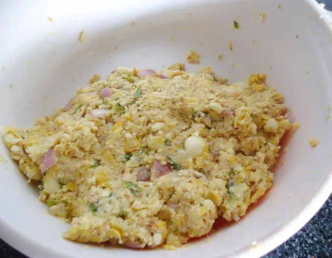 mixing ingredients to make a dough for paneer cutlet