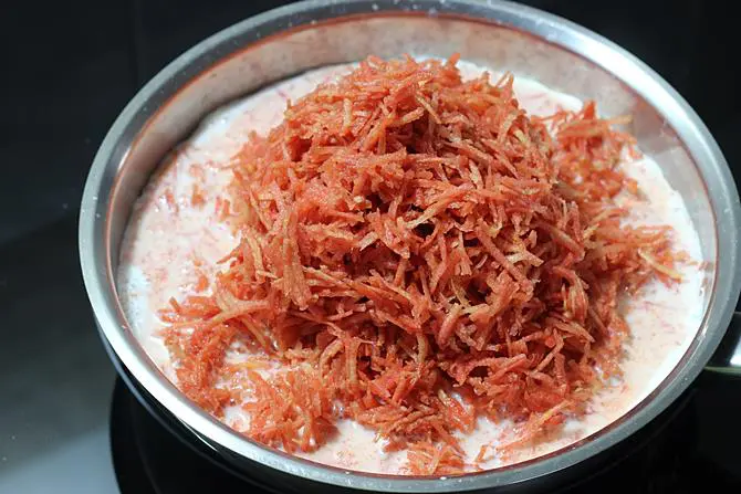 addition of grated gajar for carrot halwa