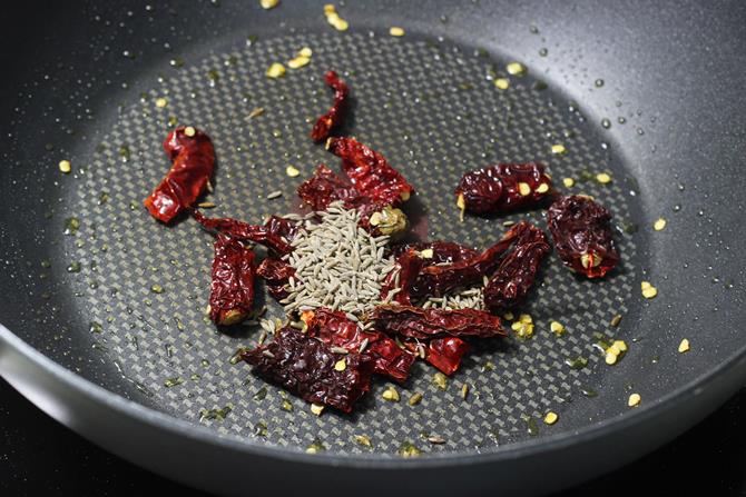 fry chilies and cumin