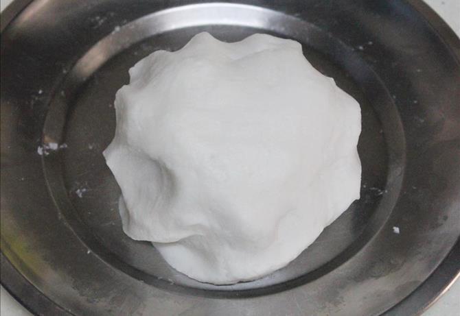kneading rice flour dough for undrallu