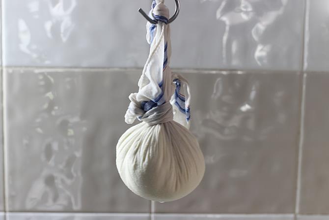 hanging paneer for draining in rasmalai recipe