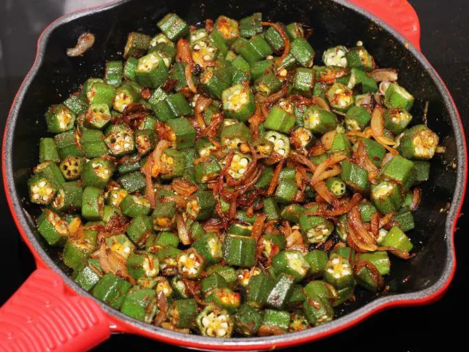 sauteing bhindi ki sabji in spices