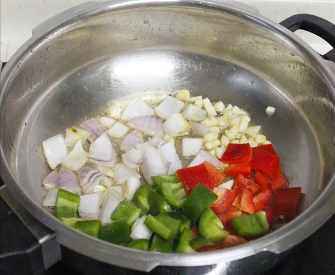 seasoning with garlic onion peppers to make chilli fish recipe