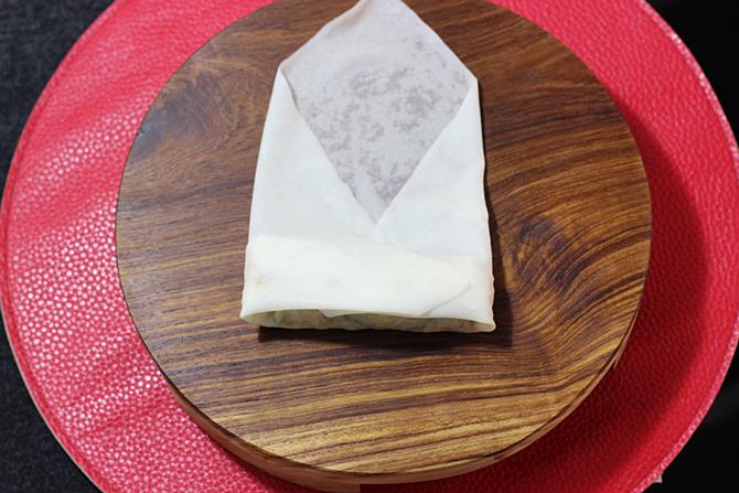 sealing edges of spring roll wrappers