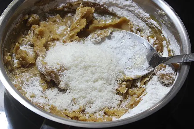 addition of coconut to make teepi kudumulu recipe