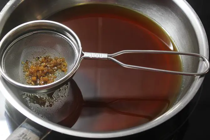 filtering syrup to remove dust