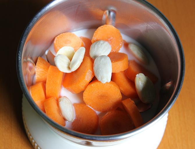 Add chopped carrots, soaked and blanched almonds and milk