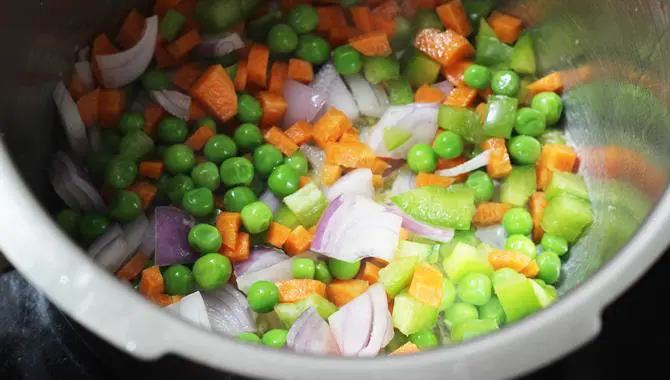 frying veggies for making khichdi recipe for toddlers