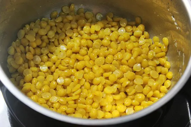 preparing dal stuffing for poornam kudumulu recipe