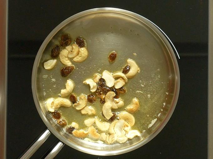 Fry cashews until light golden