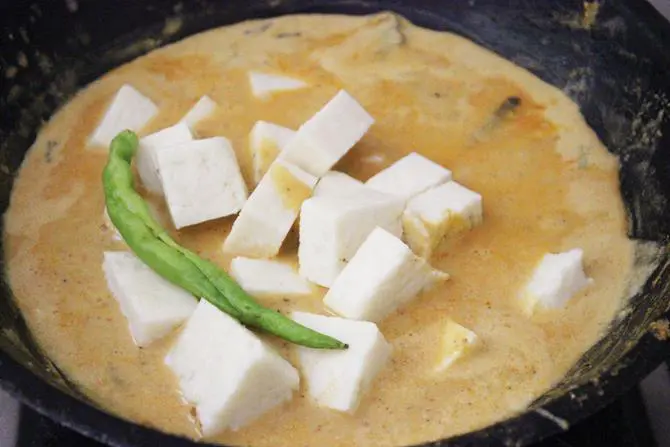 adding paneer in shahi paneer gravy