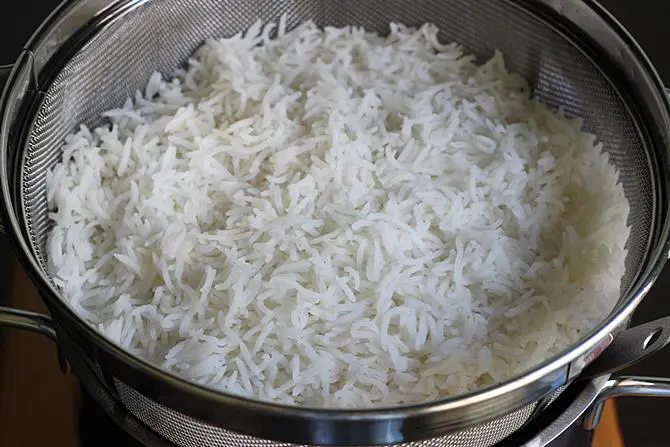 Drain rice to a colander to make fried rice recipe