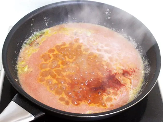 pouring tomato puree