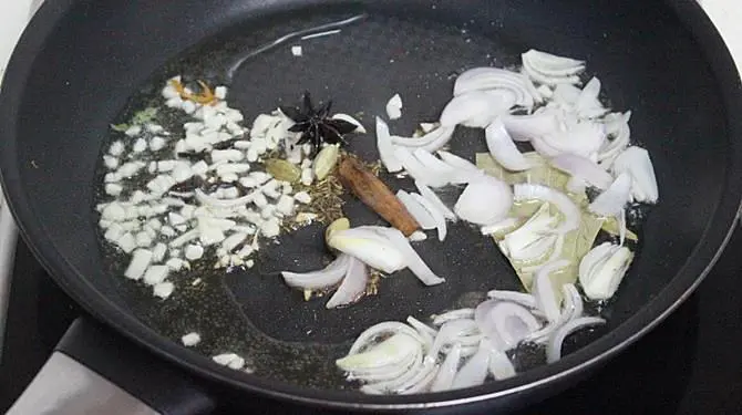 frying ginger garlic to make potato rice recipe