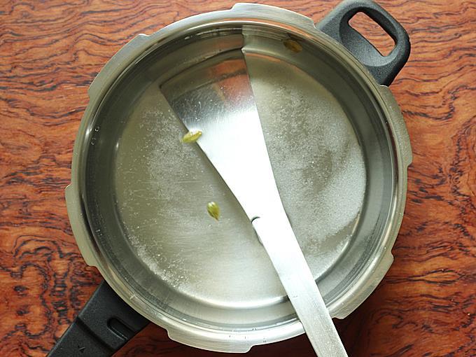 Pouring water to make sugar syrup for rasgulla