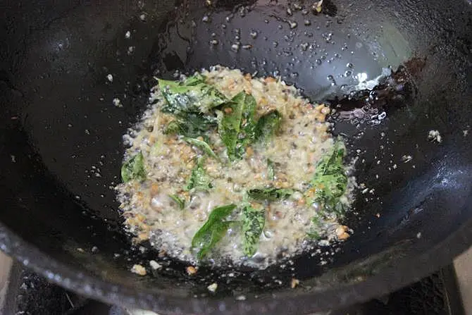 frying ginger garlic paste for aratikaya vepudu