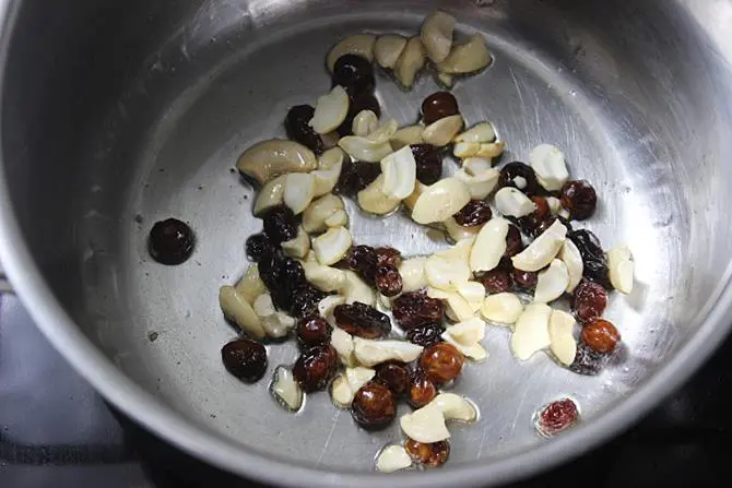frying raisins cashews in ghee for semiya kesari recipe