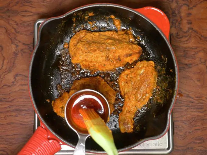 making spicy oil for tandoori chicken