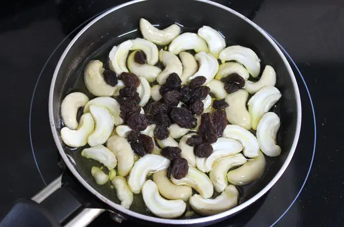 frying nuts in ghee for chakkara pongal