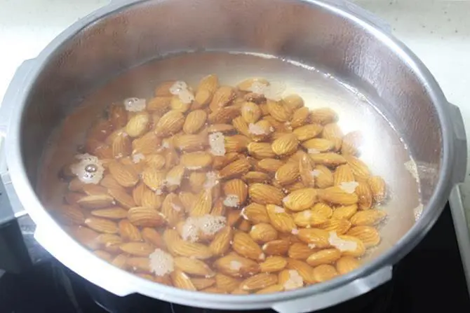 add almonds to hot water