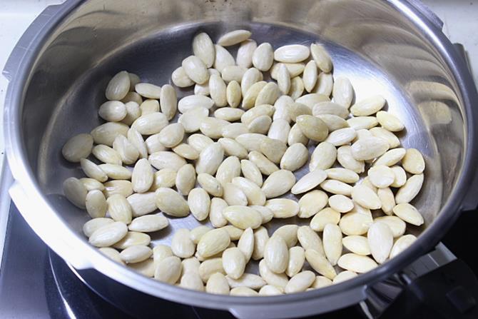 dry roasting blanched nuts to make almond meal