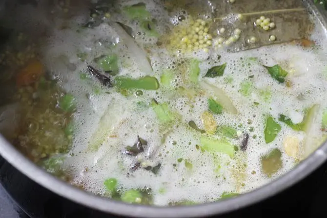 frying veggies for millet biryani